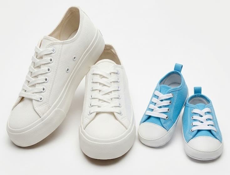 White platform sneakers and blue kids' sneakers