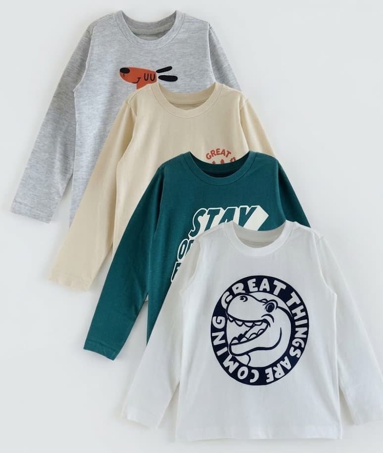 Four kids' long sleeve tees in grey, cream, teal and white with prints
