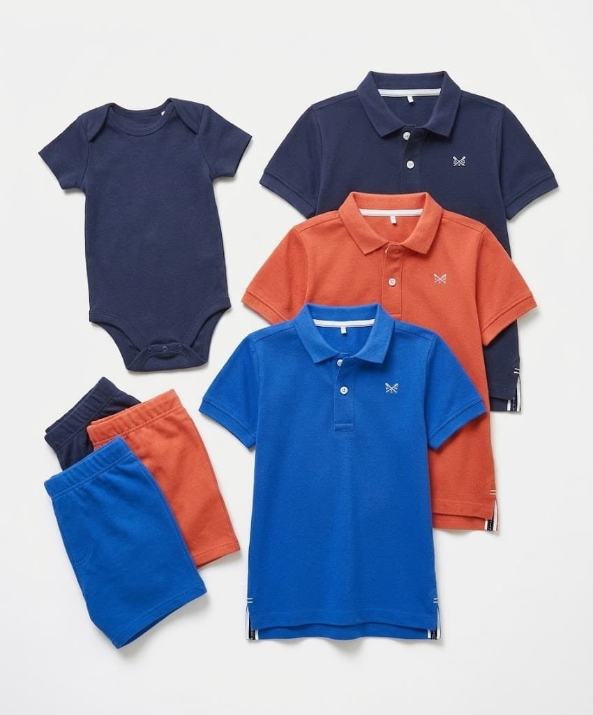 Boys' polo shirts, onesie and shorts in navy, orange and blue