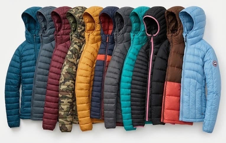 Row of hooded down jackets in teal, burgundy, camo, mustard and blue